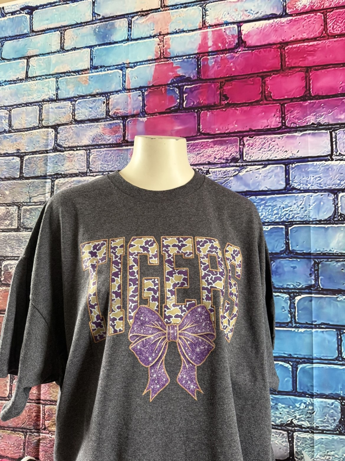 A Tigers custom shirt on a display form