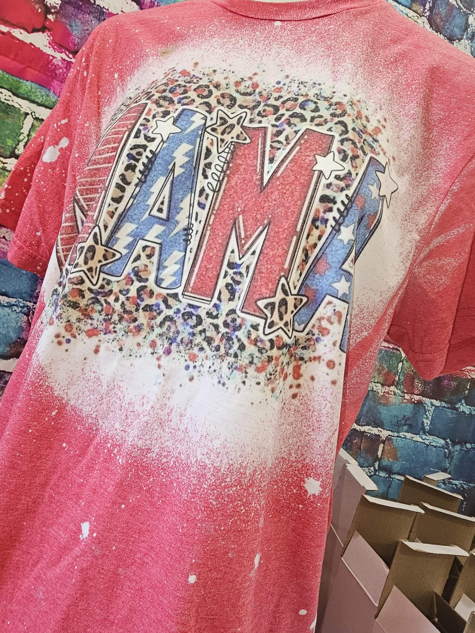 A pink custom initial shirt