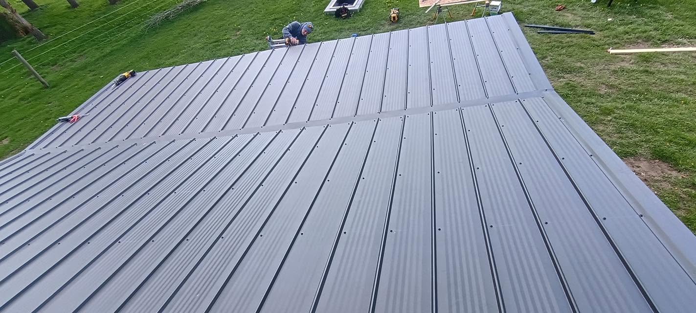 Close view of metal panels on barn roof