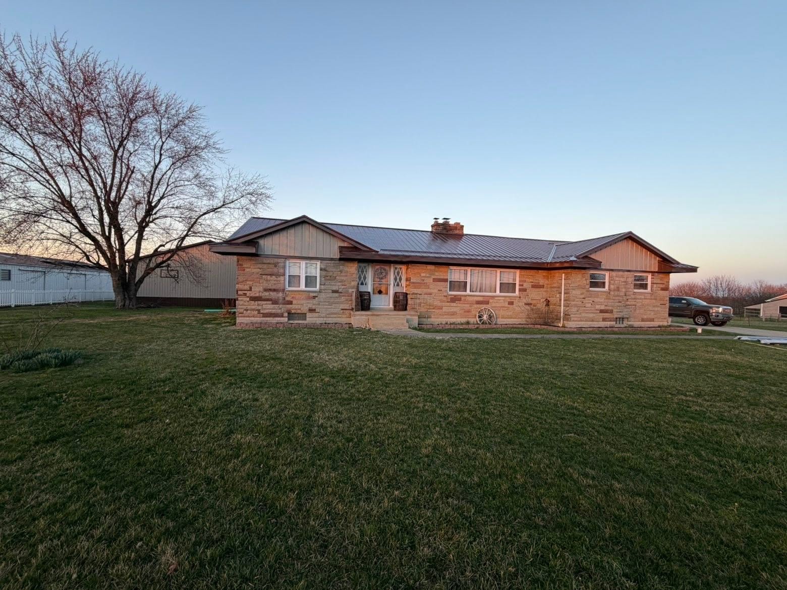 Brick ranch entry roof and trim detail