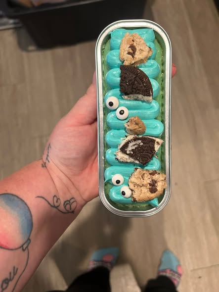 A blue cookie themed dessert tin